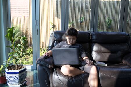 Asian boy study from homeの写真素材