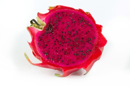 Healthy red dragon fruit against white backgroundの写真素材