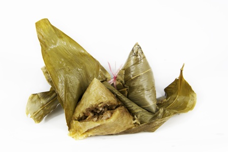 traditional glutonius rice dumpling wrap in leaves の写真素材