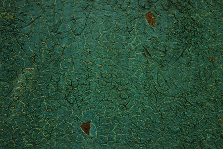 old cracked green paint. Grungy texture. Backgroundの写真素材