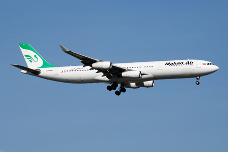 ISTANBUL / TURKEY - MARCH 28, 2019: Mahan Air Airbus A340-300 EP-MMT passenger plane landing at Istanbul Ataturk Airportのeditorial素材