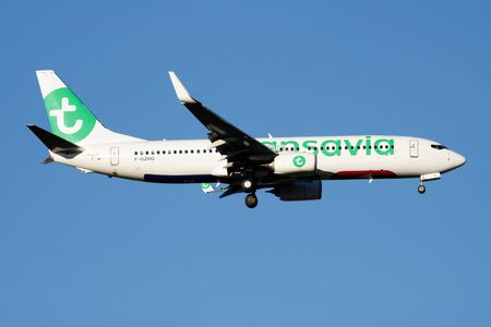 MADRID / SPAIN - MAY 2, 2016: Transavia Boeing 737-800 F-GZHQ passenger plane landing at Madrid Barajas Airportのeditorial素材