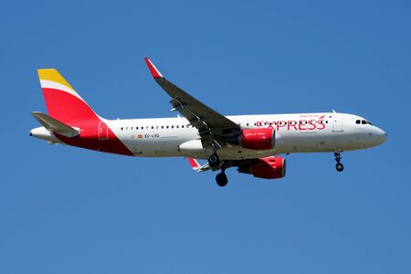 MADRID / SPAIN - MAY 2, 2016: Iberia Express Airbus A320 EC-LVQ passenger plane landing at Madrid Barajas Airportのeditorial素材