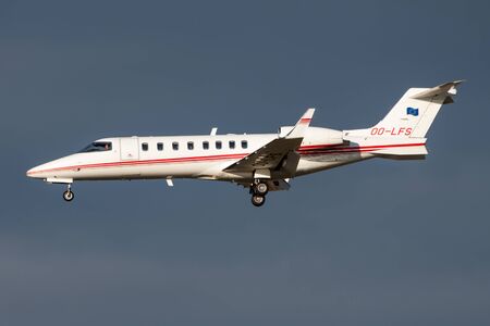 FRANKFURT / GERMANY - DECEMBER 4, 2012: Abelag Aviation Learjet 45 OO-LFS private business jet landing at Frankfurt Airportのeditorial素材