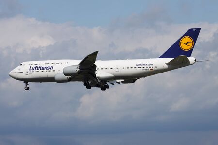 FRANKFURT / GERMANY - AUGUST 17, 2014: Lufthansa Boeing 747-8 D-ABYF passenger plane landing at Frankfurt airportのeditorial素材