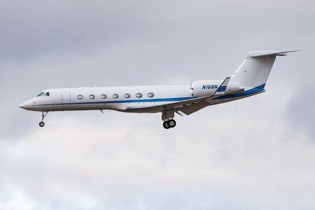 FRANKFURT / GERMANY - DECEMBER 4, 2012: Gulfstream G-V-SP G550 N168NJ private business jet landing...