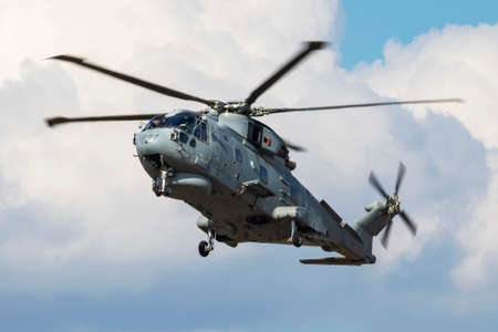 FAIRFORD / UNITED KINGDOM - JULY 12, 2018: Royal Navy EH-101 Merlin HM1 ZH839 helicopter arrival for RIAT Royal International Air Tattoo 2018 airshowのeditorial素材