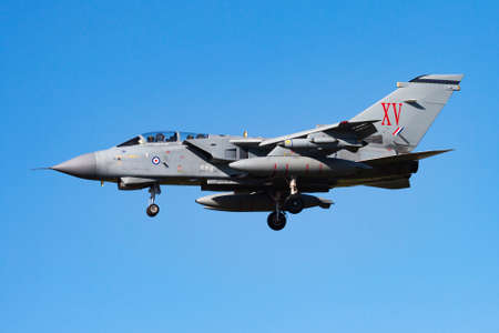 Kecskemet, Hungary - August 2, 2013: Military fighter jet plane at air base. Air force flight operation. Aviation and aircraft. Air defense. Military industry. Fly and flying.のeditorial素材