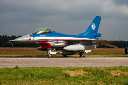 Volkel, Netherlands - June 14, 2013: Military fighter jet plane at air base. Air force flight operation. Aviation and aircraft. Air defense. Military industry. Fly and flying.のeditorial素材