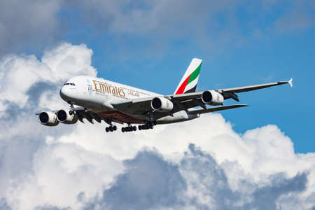 Munich, Germany - March 19, 2013: Emirates passenger plane at airport. Schedule flight travel. Aviation and aircraft. Air transport. Global international transportation. Fly and flying.のeditorial素材