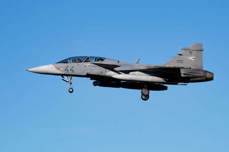 Kecskemet, Hungary - September 27, 2018: Military fighter jet plane at air base. Air force flight operation. Aviation and aircraft. Air defense. Military industry. Fly and flying.のeditorial素材