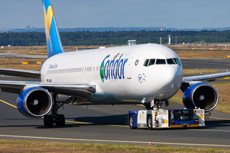 Frankfurt, Germany - August 12, 2014: Condor passenger plane at airport. Schedule flight travel. Aviation and aircraft. Air transport. Global international transportation. Fly and flying.のeditorial素材