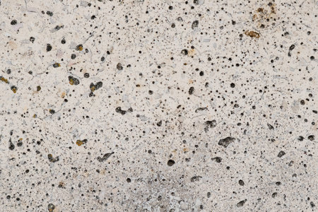 Cracked and abstract grunge texture. Aged material surface backdrop. Weathered effect pattern. Old and dirty background. Graphic resource.の写真素材