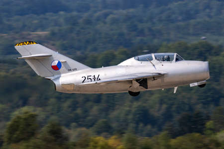 Sliac, Slovakia - September 2, 2018: Old timer warbird at air base. Aviation and aircraft. Air defense. Military industry. Fly and fly.のeditorial素材