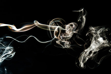 Smoke effect texture. Isolated background. Black and dark background. Smokey fire and mystical effect. Spirit wave. Photo realistic mist stock image.の写真素材
