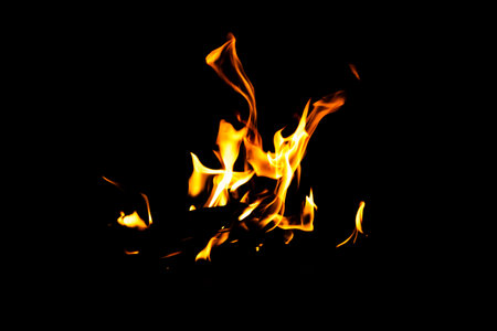 Fire flame texture. Burning material backdrop. Burn effect pattern. Blaze and torch wallpaper. Heat...