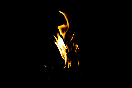 Fire flame texture. Burning material backdrop. Burn effect pattern. Blaze and torch wallpaper. Heat and haze backdrop. Exploison and hot background.の写真素材