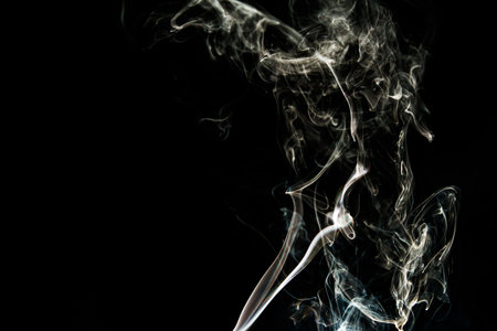 Smoke effect texture. Isolated background. Black and dark background. Smokey fire and mystical effect. Spirit wave. Photo realistic mist stock image.の写真素材