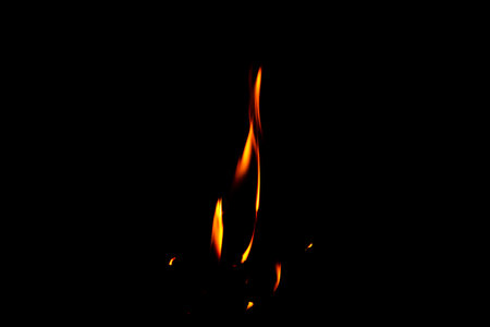Fire flame texture. Burning material backdrop. Burn effect pattern. Blaze and torch wallpaper. Heat and haze backdrop. Exploison and hot background.の写真素材