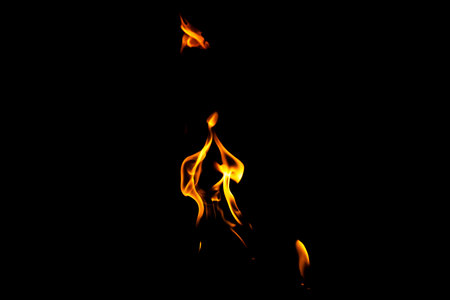 Fire flame texture. Burning material backdrop. Burn effect pattern. Blaze and torch wallpaper. Heat and haze backdrop. Exploison and hot background.の写真素材