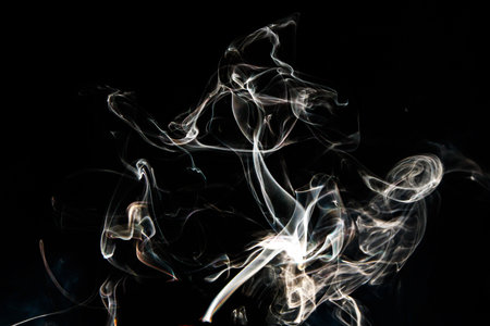 Smoke effect texture. Isolated background. Black and dark background. Smokey fire and mystical effect. Spirit wave. Photo realistic mist stock image.の写真素材