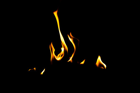 Fire flame texture. Burning material backdrop. Burn effect pattern. Blaze and torch wallpaper. Heat and haze backdrop. Exploison and hot background.の写真素材