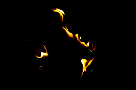 Fire flame texture. Burning material backdrop. Burn effect pattern. Blaze and torch wallpaper. Heat and haze backdrop. Exploison and hot background.の写真素材
