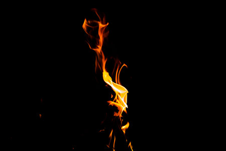 Fire flame texture. Burning material backdrop. Burn effect pattern. Blaze and torch wallpaper. Heat...
