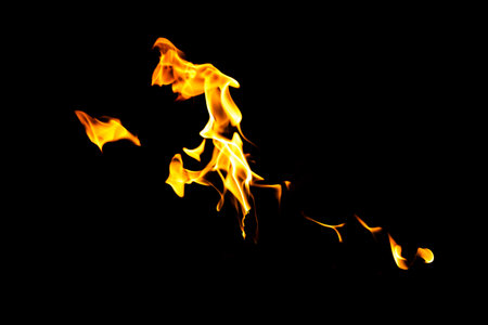 Fire flame texture. Burning material backdrop. Burn effect pattern. Blaze and torch wallpaper. Heat and haze backdrop. Exploison and hot background.の写真素材