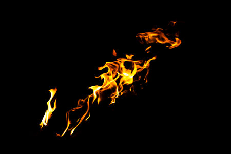 Fire flame texture. Burning material backdrop. Burn effect pattern. Blaze and torch wallpaper. Heat and haze backdrop. Exploison and hot background.の写真素材