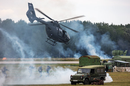 Kecskemet, Hungary - August 28, 2021: Military helicopter at air base. Air force flight transportation. Aviation and rotorcraft. Transport and airlift. Military industry. Fly and fly.のeditorial素材
