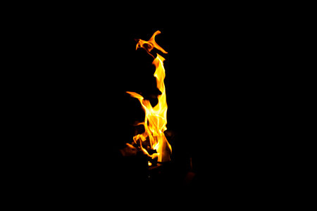Fire flame texture. Burning material backdrop. Burn effect pattern. Blaze and torch wallpaper. Heat and haze backdrop. Exploison and hot background.の写真素材