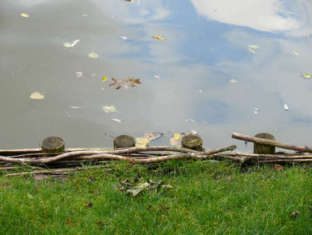 Weekend tranquility. Shore of a lake.の写真素材