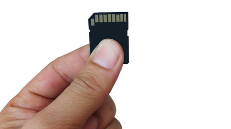 Memory card in hand on white blackMemory card in hand on white backgroundground