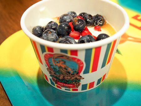 London, England - September 29 2015: Leon? S London porridge with yogurt, blueberries, seeds ,? healthy breakfast in a British fast foodのeditorial素材