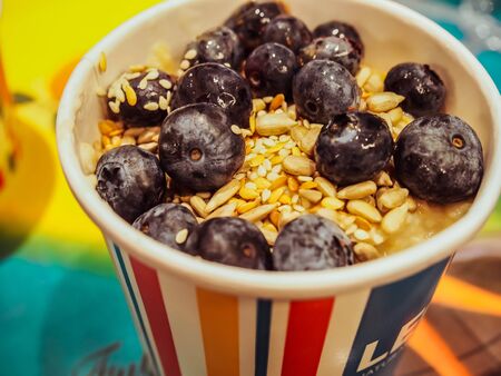London, England - September 29 2015: Leon? S London porridge with yogurt, blueberries, seeds ,? healthy breakfast in a British fast foodのeditorial素材