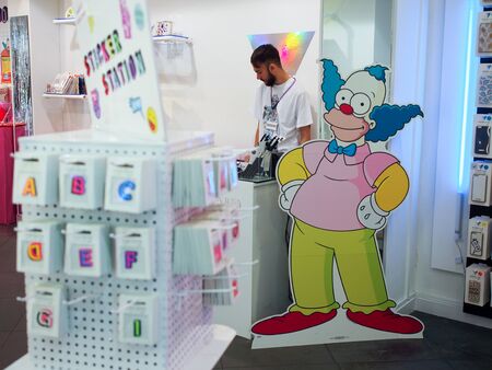 London, England - September 28 2015: Skinnydip flagship store: funny and sparkling phone, fashion and home accessoriesのeditorial素材