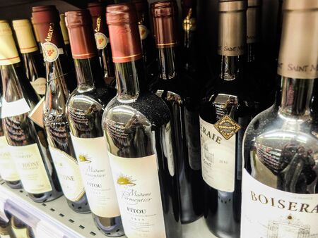 Charleroi, Belgium - December 28 2019: Bottles of wine in a grocery storeのeditorial素材