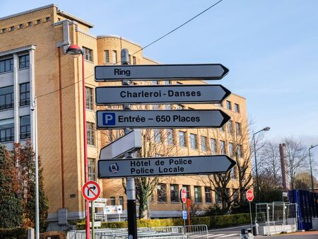 Charleroi, Belgium - December 28 2019: Road sign: Ring; Charleroi Dance; Police station and local...