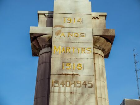 Charleroi, Belgium - December 28 2019: Monument to the martyrs, memorial, bronze and stone sculpture by ?mile Devreux and Jules Lagae in a neoclassical and Doric style in 1923のeditorial素材