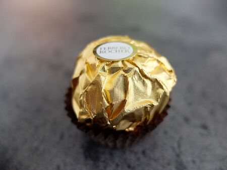 Charleroi, Belgium - December 28 2019: Ferrero Rocher chocolate pralines with hazelnutのeditorial素材