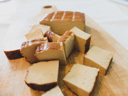 Smoked tofu is used in Asian food but also for vegetarian and vegan people. Meatless source of protein with a great taste.の写真素材