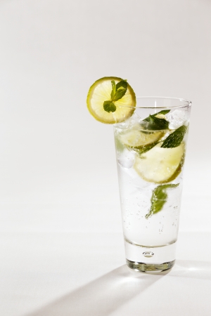 A refreshing hot summer drink in the desert is a lemon and lime spritser garnished with mintの写真素材