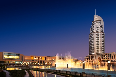 The Dancing Fountain of Dubai performs at dusk  It performs and dances to the beat of the selected music  The fountain is overlooked by Dubai Mall and the Address Hotelsのeditorial素材