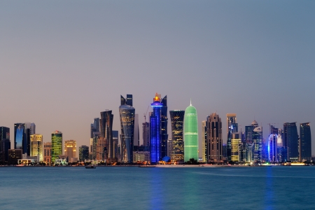 Doha, Qatar at Dusk is a beautiful city skyline of impressive contemporary architectureのeditorial素材