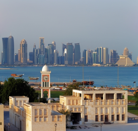 Doha, Qatar  A contrasting style of architecture can be seen each side of the bayのeditorial素材
