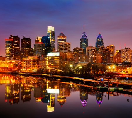 A dusk image of the City of Philadelphia, is reflected in the still waters of The Scullykill River, as seen from the South Bridgeのeditorial素材