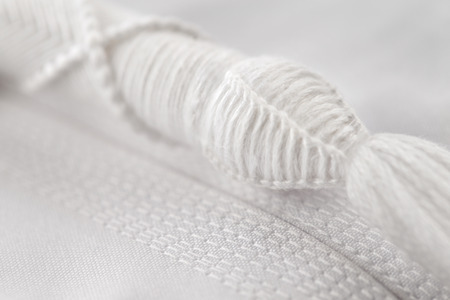 An abstract detail of a Tarboosh which is an Arabic style  tassel like  tie that is usually worn...