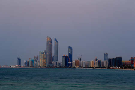 Abu Dhabi, UAE  A skyline view of the Corniche Road taken at dusk
