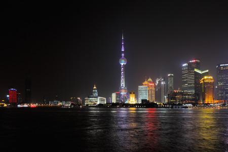 Shanghai, China  A skyline view across the Bund at night.  Shanghai is a beautiful city of...